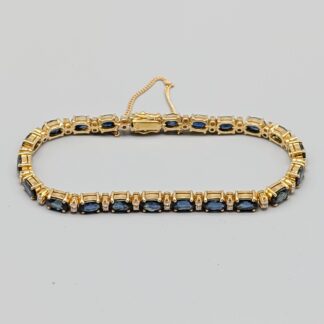 Armband i guld med blå safirer och diamanter-0